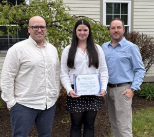 From left to right, Jesse Dimick, Director of FQHC Operations, scholarship recipient Caydence Pierce, and NCHC CEO Chris Towne.